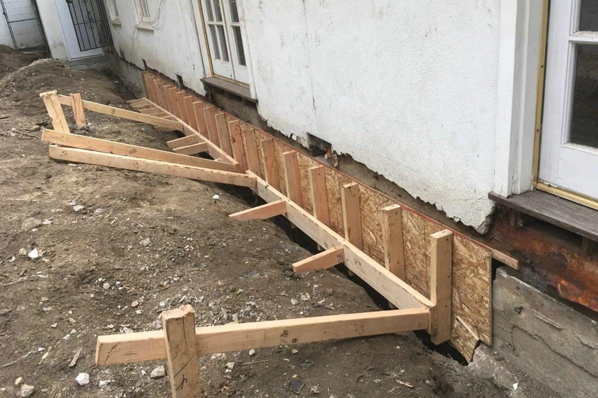 Bowing Basement Walls: Causes and Repair Options 3 Formwork in place for rebuilding a damaged foundation wall