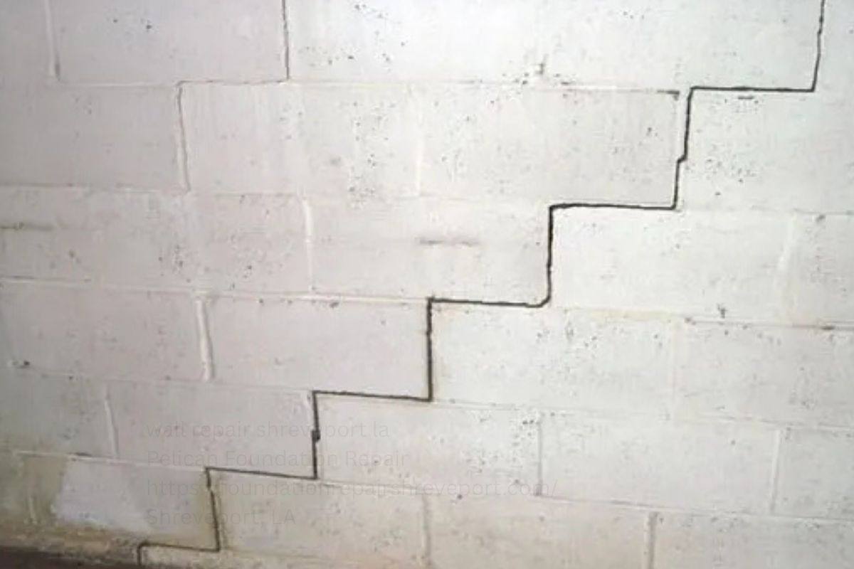Bowing Basement Walls: Causes and Repair Options 2 Stair-step cracks in a concrete block foundation wall caused by lateral soil pressure